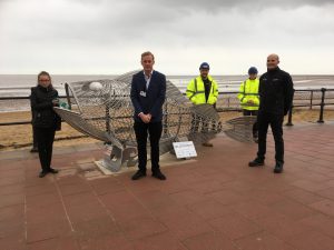 Pictured with Hammy the Haddock are competition winner Lilly-Mai Halligan, Cllr Callum Procter portfolio holder for Tourism, Heritage and Culture at NELC, and operations director Ben Tiffney , fabricator Logan Marklew and apprentice fabricator Ryan Meggit from Blackrow Engineering.