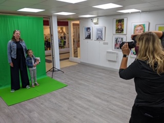 Annabel McCourt photographing local people for the St James' Square artwork