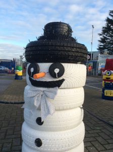 A snowman made of tyres.