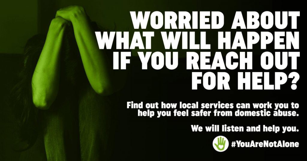 A domestic abuse poster saying: Worried about what will happen if you reach out for help?