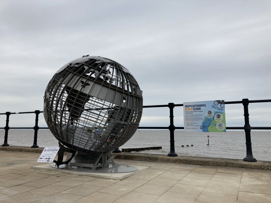 Recycling globe sculpture on North Promenade in Cleethoroes.
