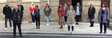 Trainee Emotional Literacy Support Assistants pose for a photo outside Grimsby Town Hall