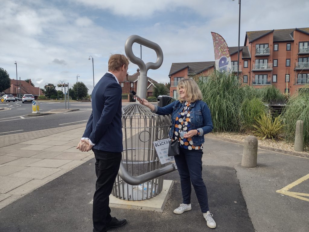 BBC talking to Councillor Procter by the Bucket and Spade