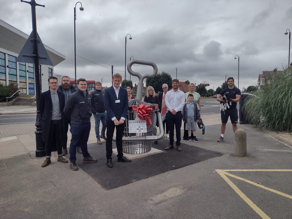 Council and some of the sponsors unveil Bucket and Spade sculpture.