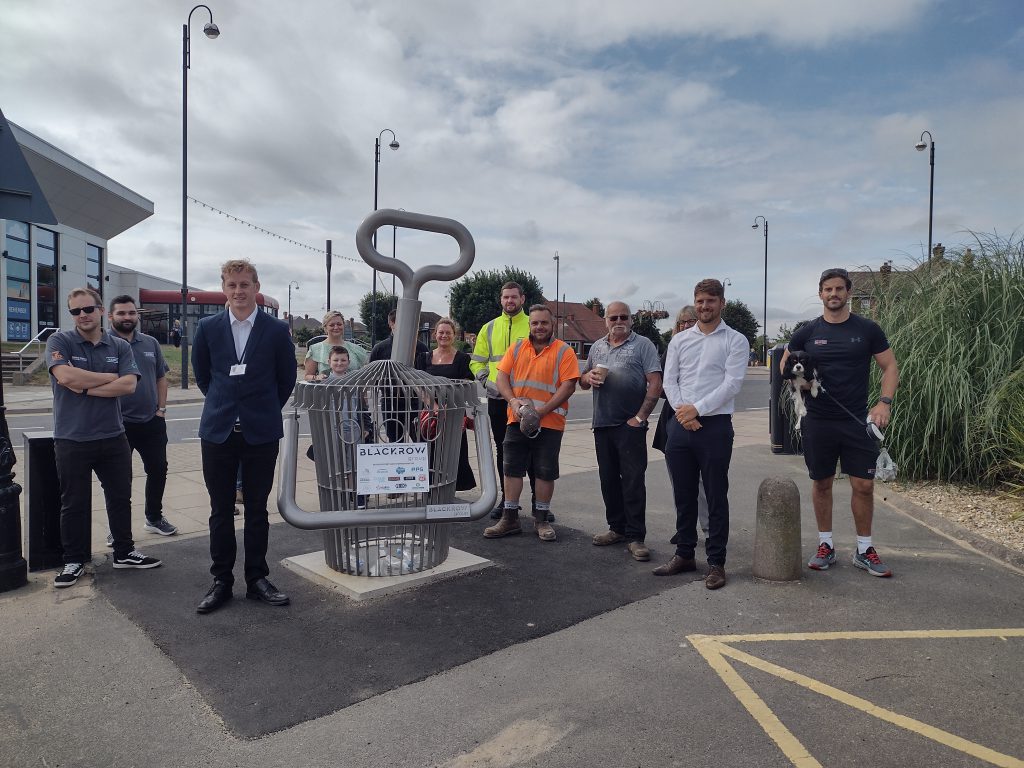 Council and some of the sponsors unveil Bucket and Spade sculpture.
