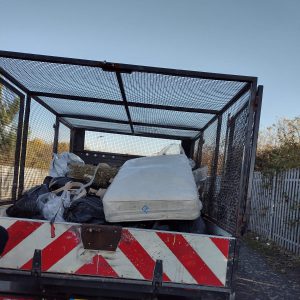 Fly-tipped waste loaded on van