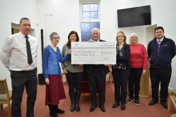 A photo of the cheque presentation