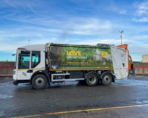 New recycling lorry with Love Weelsby Woods campaign artwork