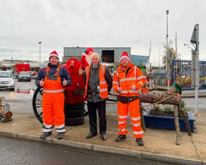 Grimsby site staff Matty Harlow and Troy Grady with Cllr Stewart Swinburn (centre).