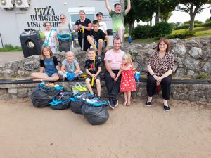 Members of the Green Influencers litter picking in Cleethorpes.