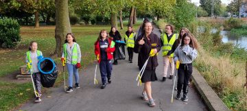 Members of the Green Influencers litter picking in Duke of York Gardens, Grimsby.