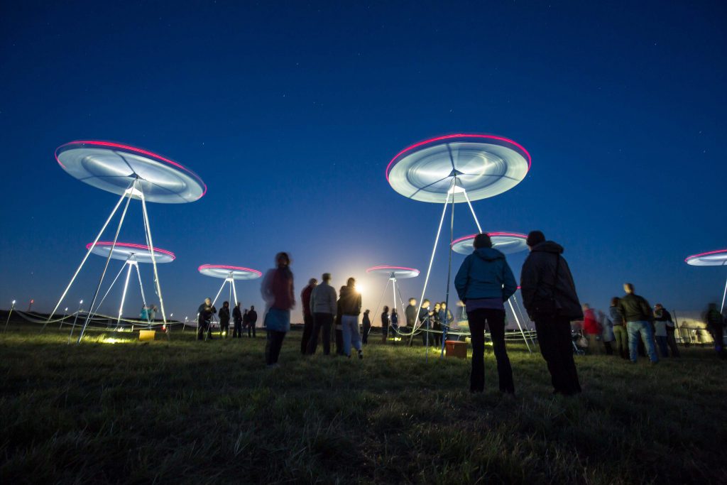 Chorus, by Ray Lee. People looking up at the sky