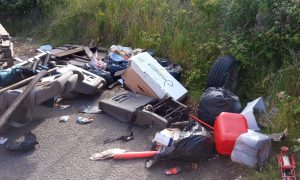 Car parts and other rubbish dumped in Gilbey Road, Grimsby