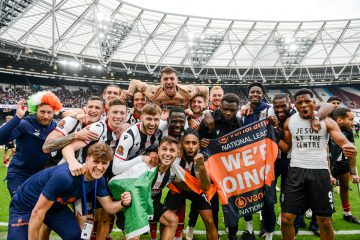 Grimsby Town players celebrating their promotion