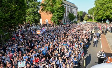 Thousands of residents outside Grimsby Town Hall waiting for GTFC to arrive to celebrate.
