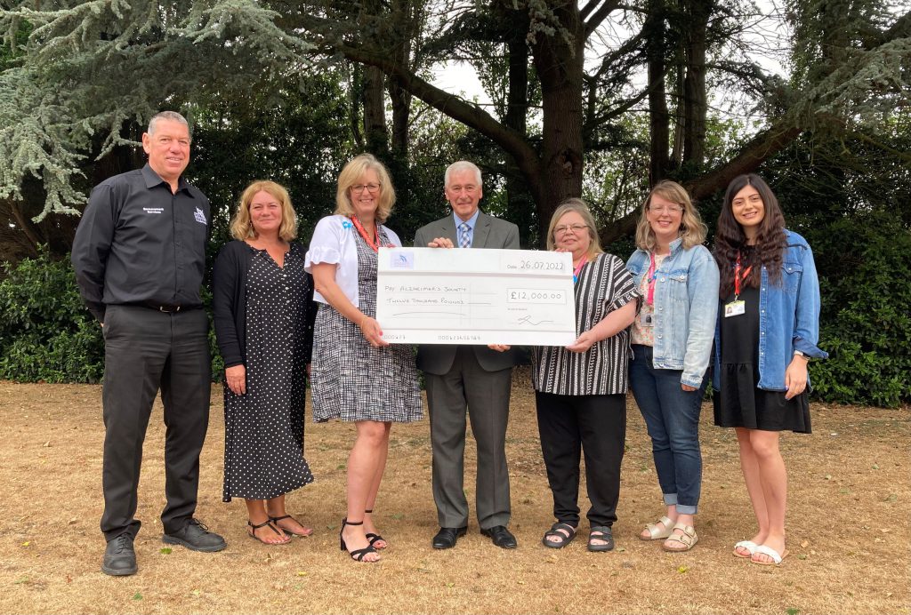 In the photo with the cheque are, from left to right, Phil Hewitt and Lisa Logan from NELC, Melanie Fullbrook from the Alzheimer’s Society, Cllr Stewart Swinburn, Karen Gray, Becky Johnson and Alice Helstern from the Alzheimer’s Society.