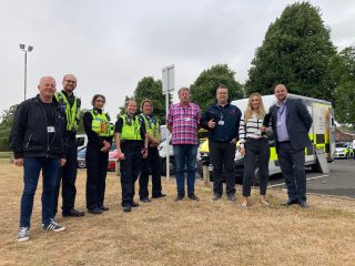 Council members, officers and police at the action day in Scartho Road, Grimsby