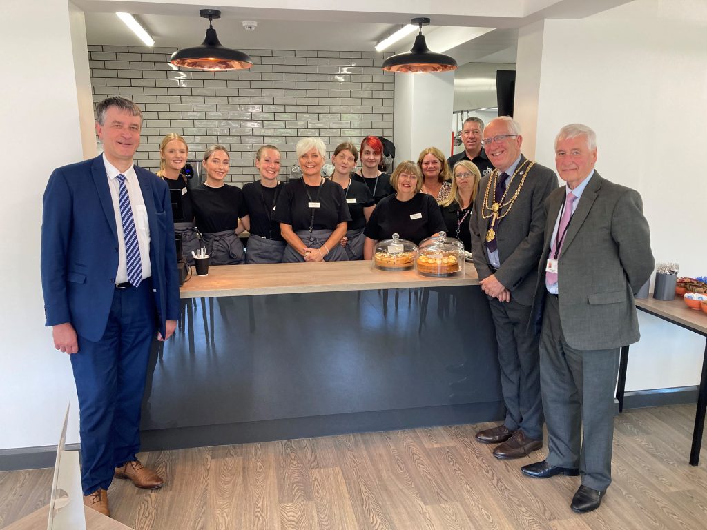 Photo shows Council leader Philip Jackson, Mayor of North East Lincolnshire Stephen Beasant and Cllr Stewart Swinburn, portfolio holder for Environment and Transport, with staff from the Bereavement Services Team at the new tea rooms.