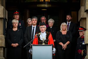 Mayor of North East Lincolnshire, Councillor Steve Beasant, reads the Accession Proclamation announcing the new King, His Majesty King Charles III, at Grimsby Town Hall alongside dignitaries. 11th September 2022 Photo by Jon Corken