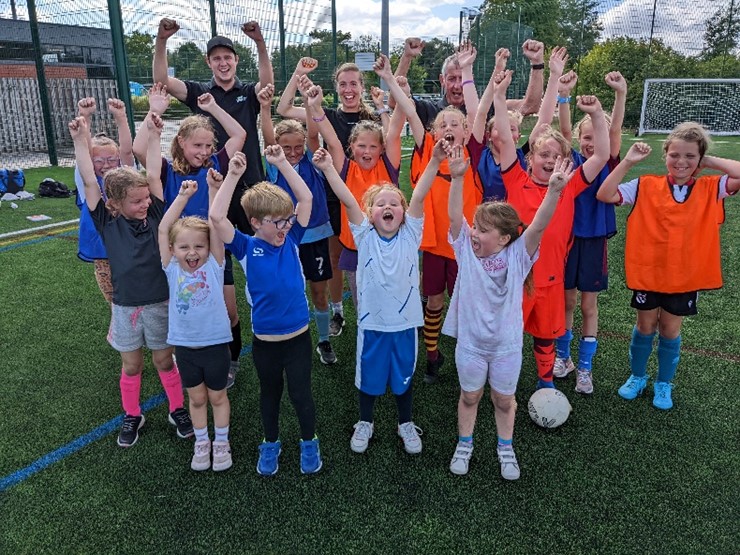 Group of children celebrating after activities