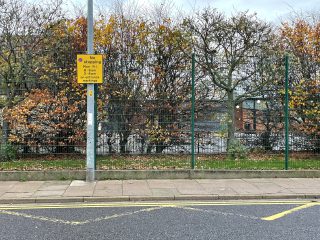 A photo of a 'no stopping' sign