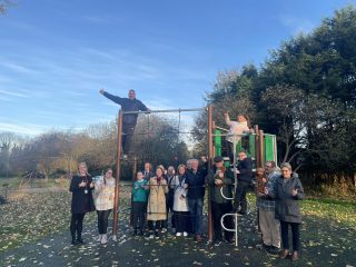 Elysia and supporters with the new play equipment