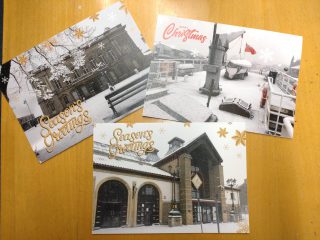 Christmas cards at Grimsby Fishing Heritage Centre, including the museum, Ross Tiger and Grimsby Town Hall.