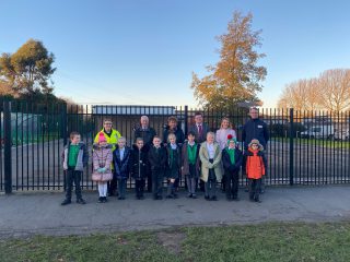 Children and adults outside Pilgrim Academy as School Streets trial launches.