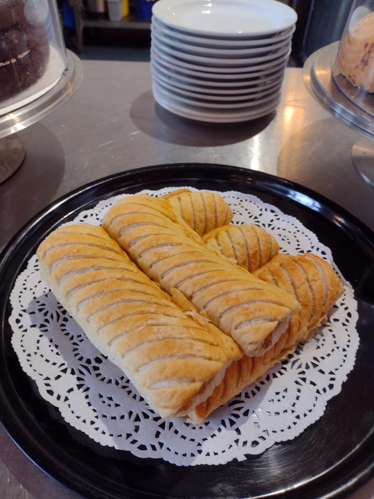 Sausage rolls on a plate.