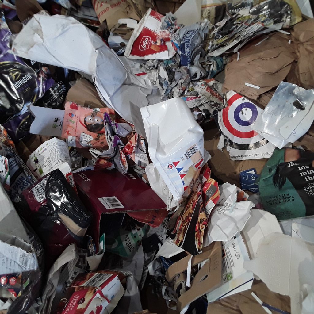 Plastic tubs and bottles were mixed in with the paper and card, so they couldn't recycle it without more sorting.