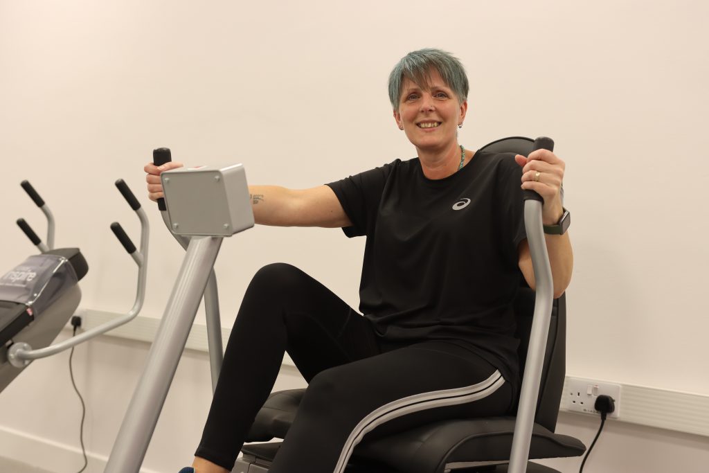 Michelle Durrant uses some of the Wellness Hub equipment.
