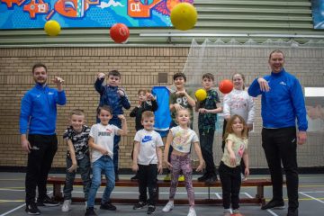 A photo of children enjoying a sporting activity