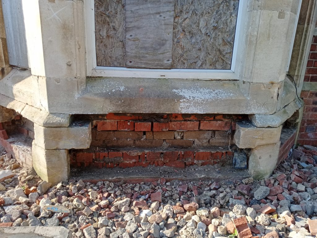 Restoration of brickwork panels before