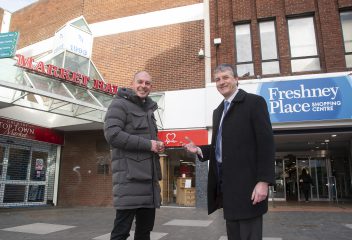 Ben Hall, Morgan Sindall and Cllr Philip Jackson, NELC Leader outside Freshney Place in Grimsby