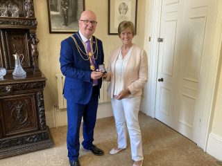 Cllr Lindley hands Civic Crown to Teresa Jackson