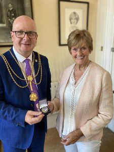 Cllr Lindley presents Civic Crown to Teresa Jackson