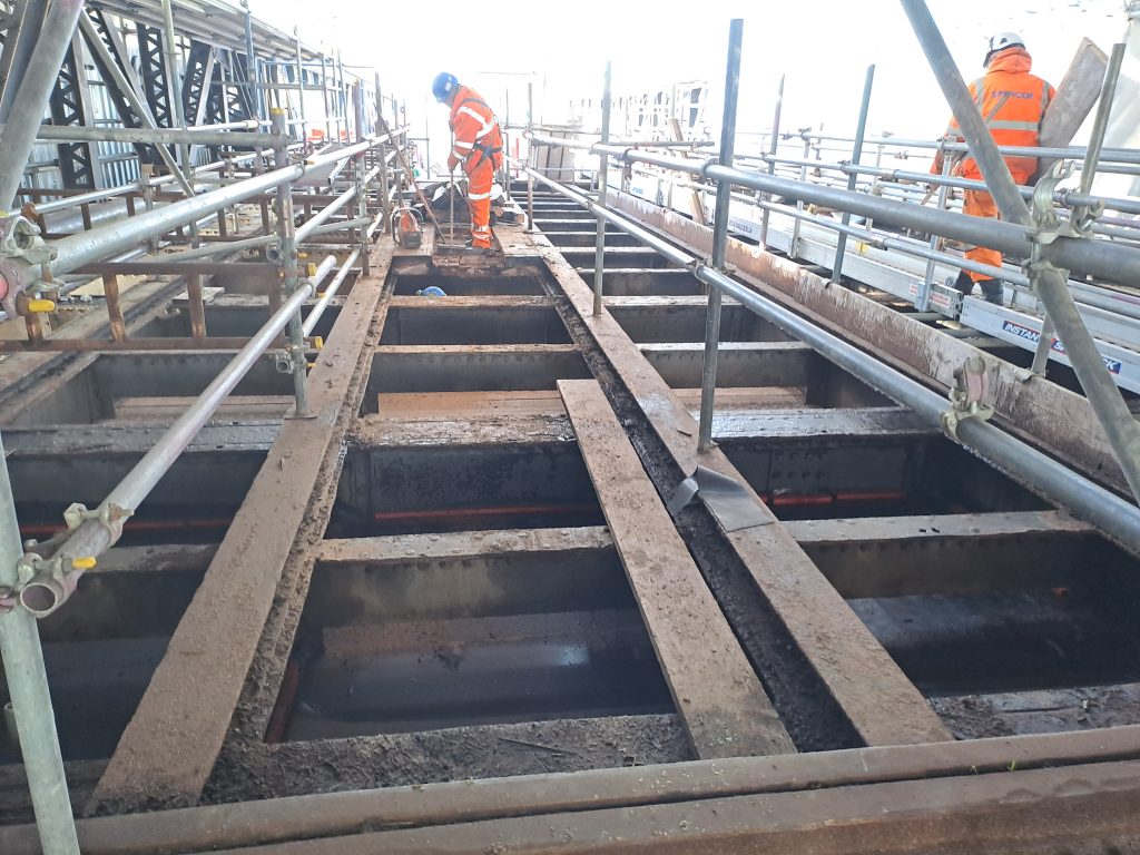 Work progresses on Corporation Bridge as removal of timber joists to the lifting section completed.