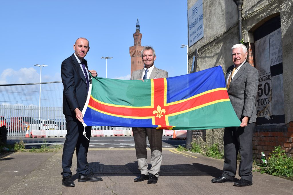 Men with Lincolnshire flag