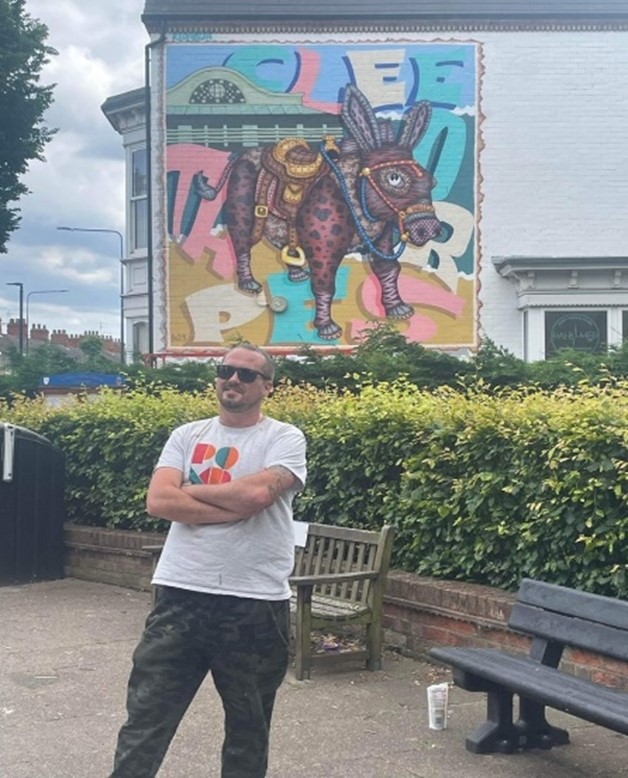 Man with Dudley mural