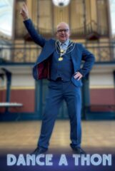 The Mayor posing to dance