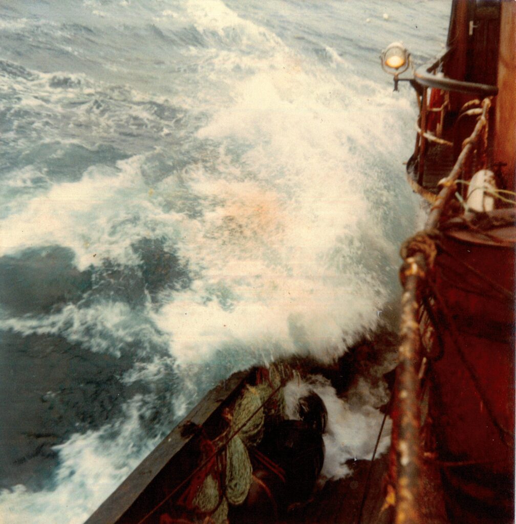 Seas over the port rail. From the Fred Powles Collection.