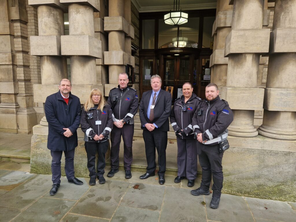 WISE enforcement team with Cllr Ron Shepherd, centre, and Neil Clark, Head of Regulatory and Enforcement Services, left