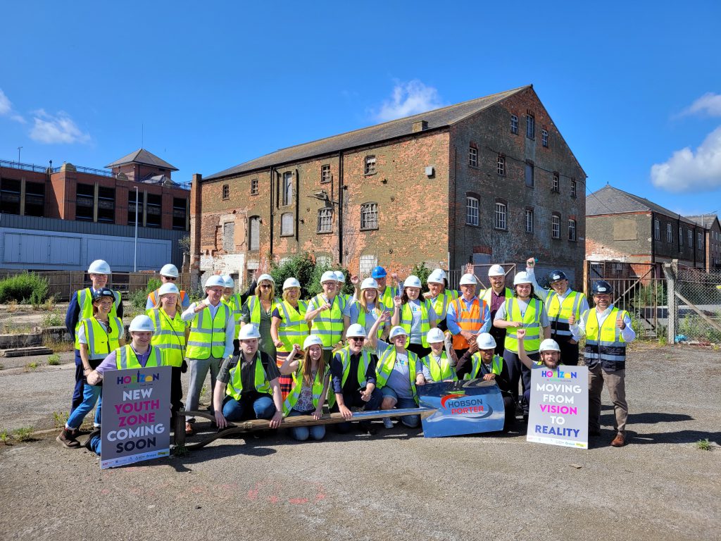 People outside construction of Onside Youth Zone