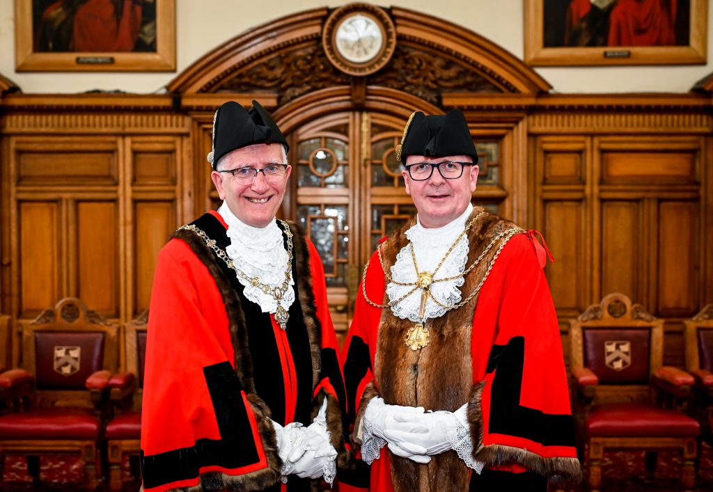 Men at Mayor making ceremony