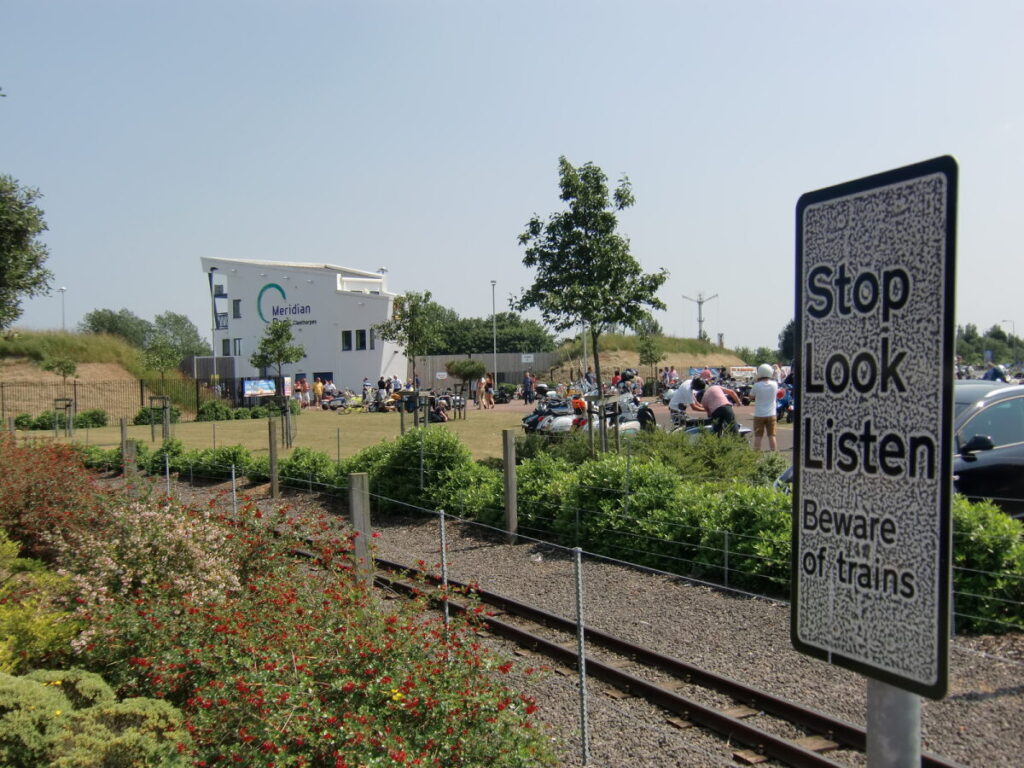 Meridian point and 'Stop, Look, Listen' train sign