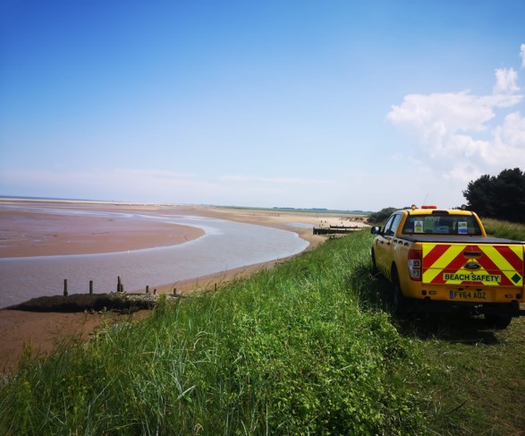 Beach safety vehicle looking over the beach