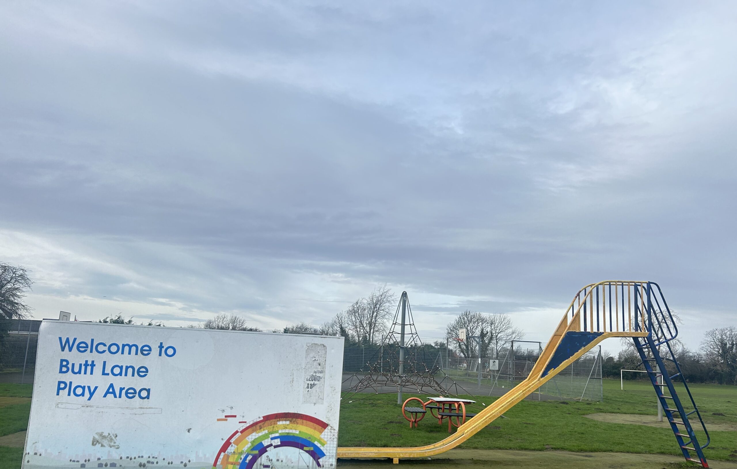 Sign and slide at Butt Lane Park