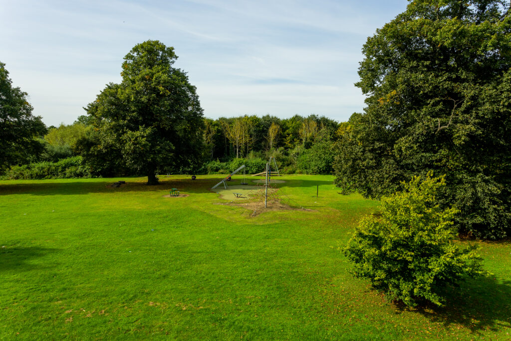 Trees and play area at Capes Recreation Ground
