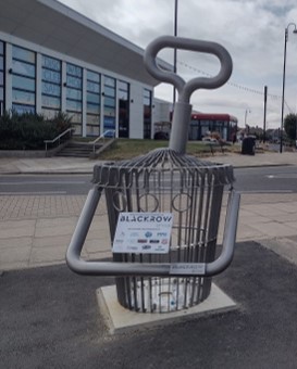 Bucket and spade shaped recycling bin