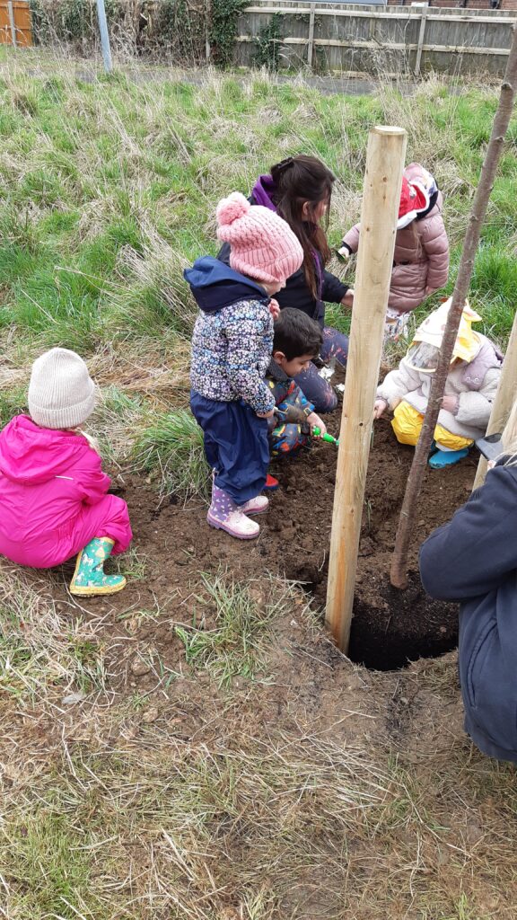 Volunteers and school children planting trees in Scartho